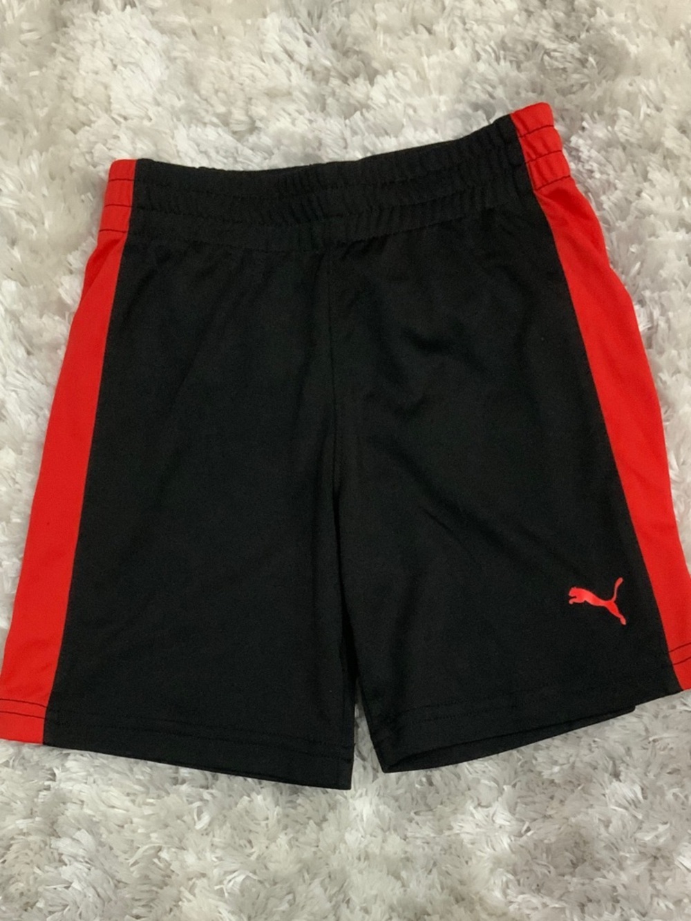 Puma Black Shorts with Red Side Stripes